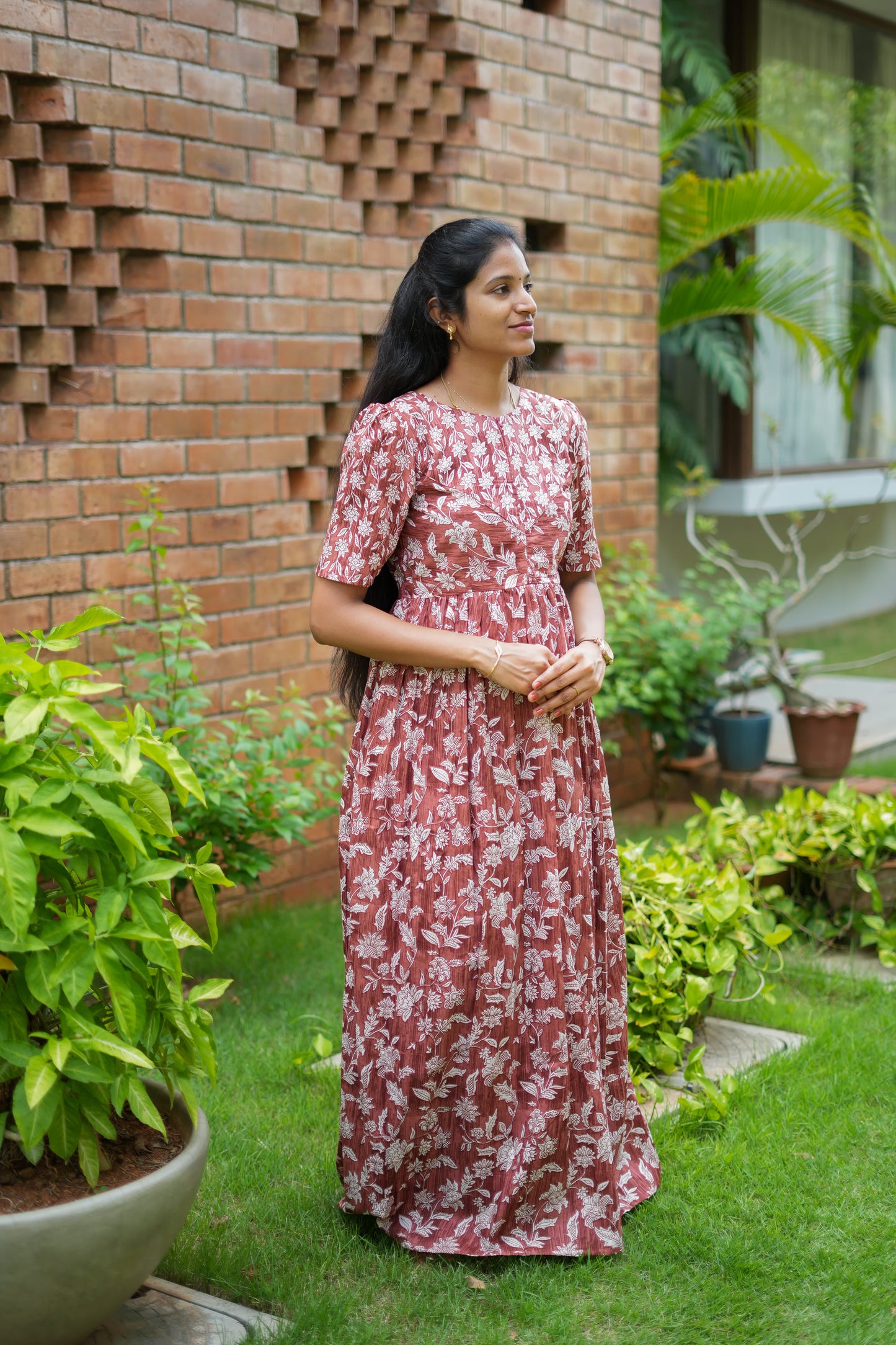 Full length view of a comfortable ladies cotton nighty in rust brown floral print