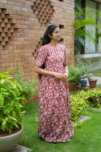 Full length view of a comfortable ladies cotton nighty in rust brown floral print