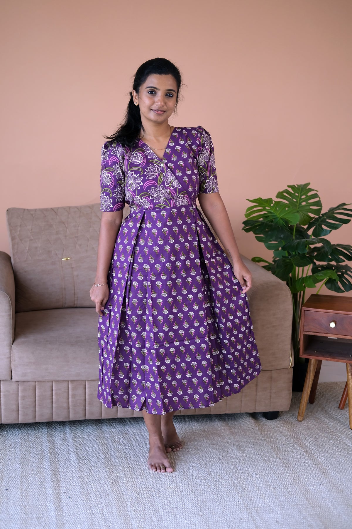 A comfortable purple cotton loungewear dress featuring a zipless design and short sleeves.