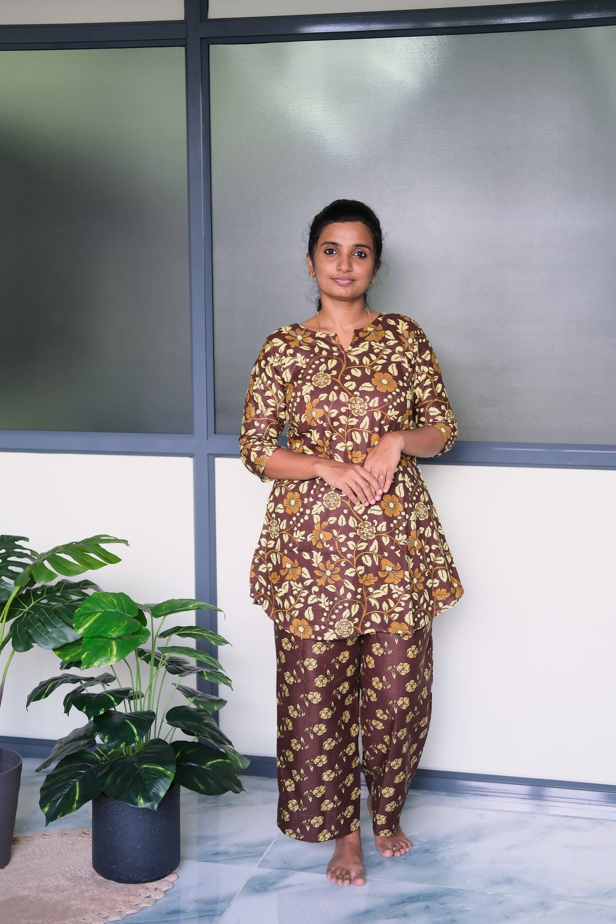 Coffee brown cotton night suit for women with mustard floral print and relaxed-fit pants