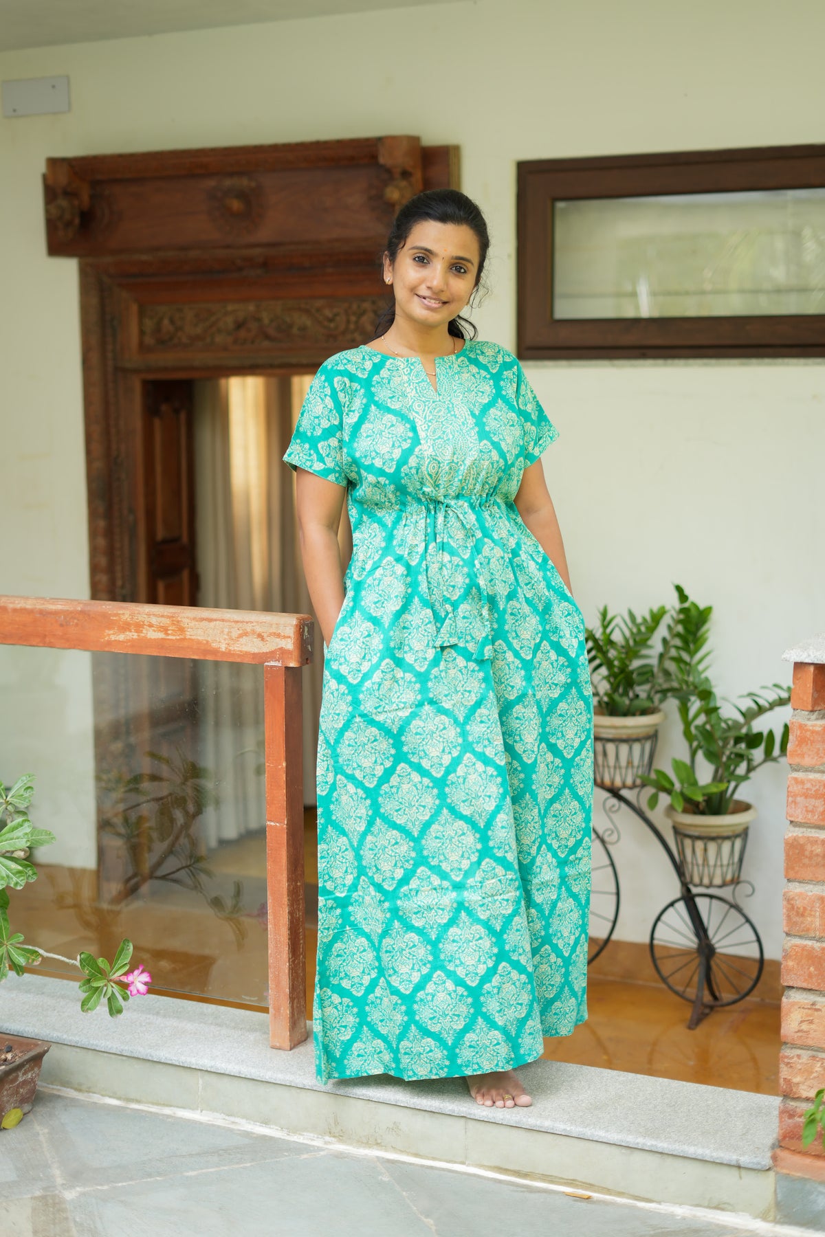 Comfortable cotton nighty with pockets in teal green and cream print