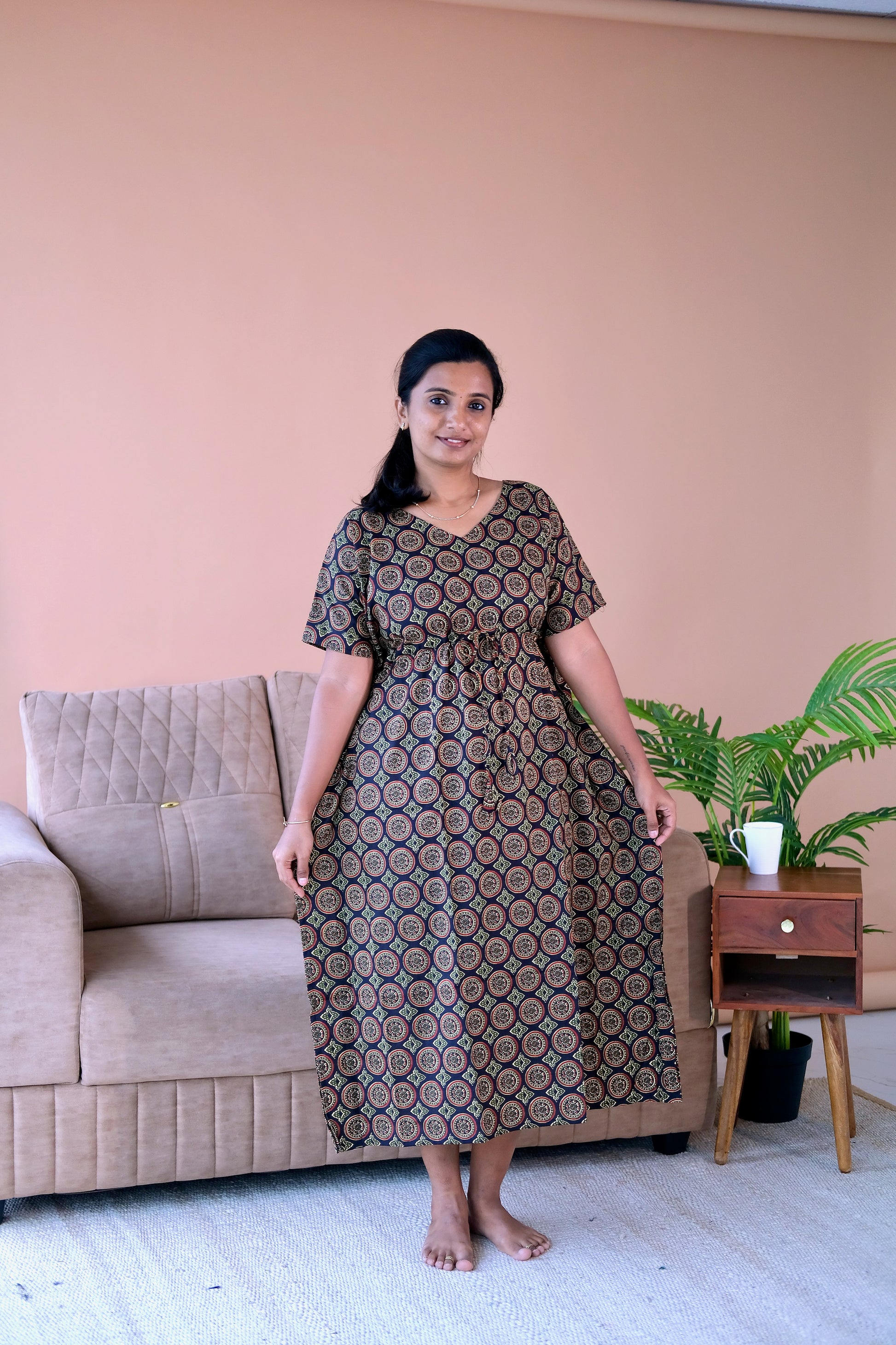 Full-length view of the ajrakh print nighty in soft cotton with short extended sleeves and a comfortable relaxed fit.