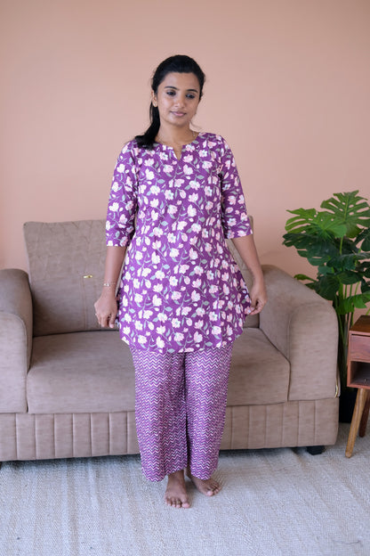 Front view of the purple cotton loungewear set with 3/4th sleeves and relaxed-fit trousers.