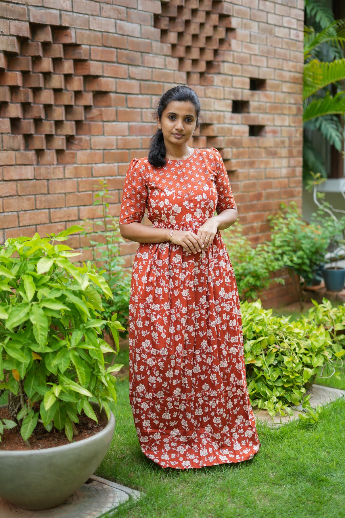 Comfortable ladies cotton maxi nighty in rust red with a relaxed fit and gathered waist