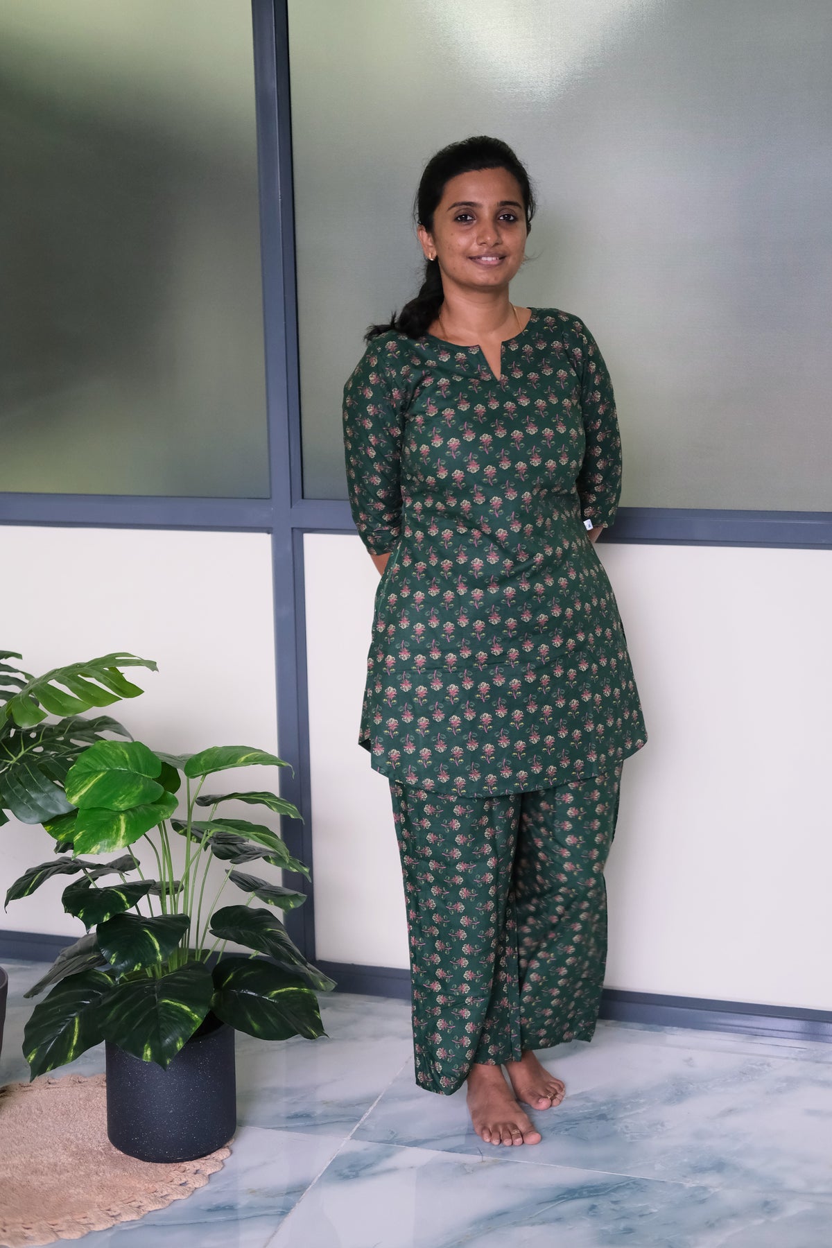 Comfortable fit of the Heera green printed loungewear set showing the kurti-style top from the front.