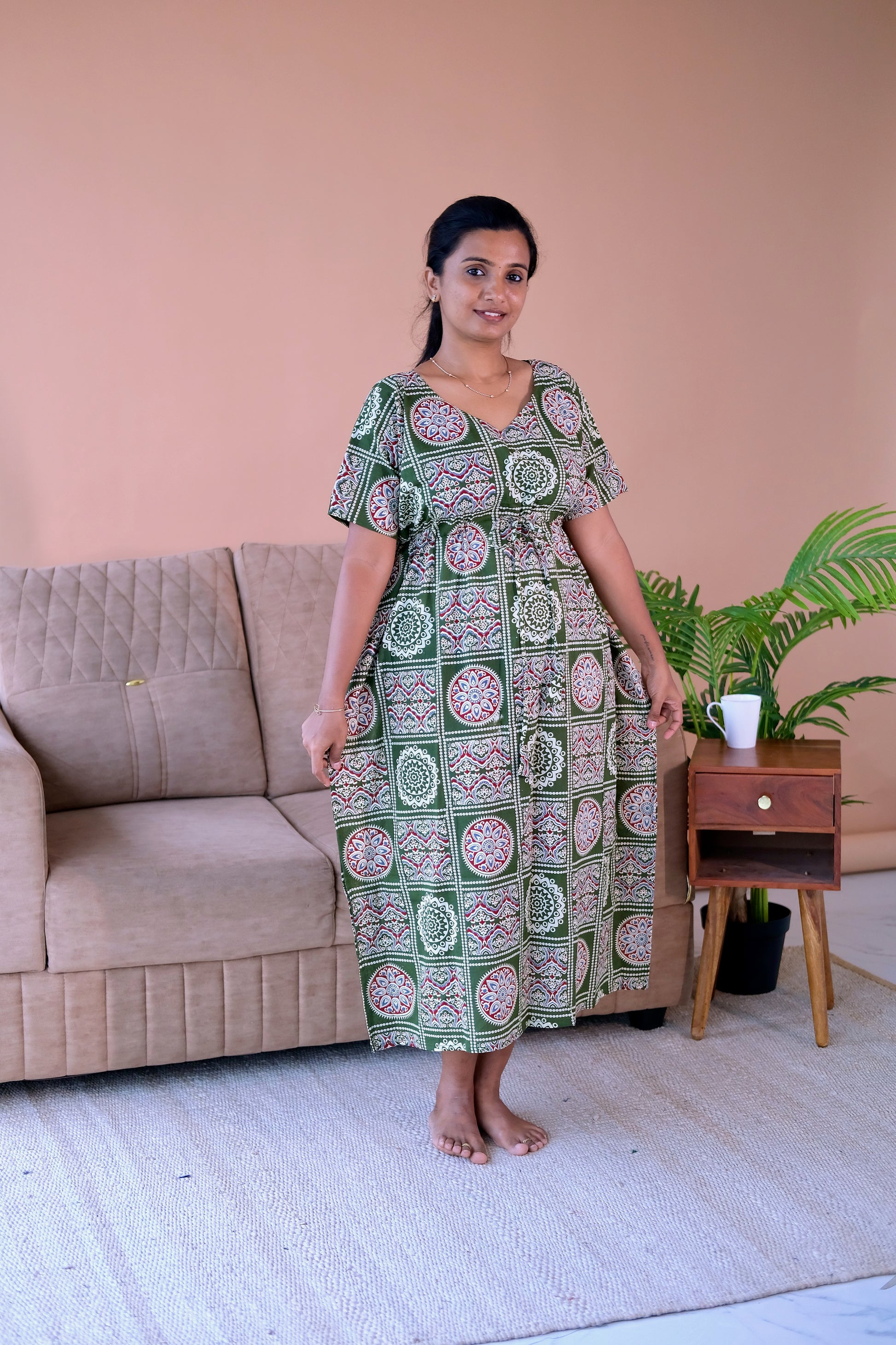 Midi nighty for women in breathable green cotton fabric featuring a comfortable relaxed fit.