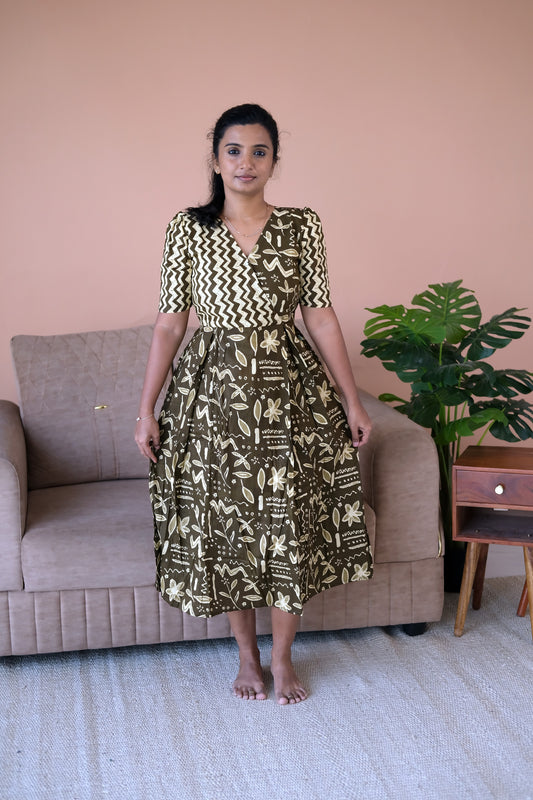 Olive green cotton midi nighty with a dual-print wrap bodice and pleated skirt.