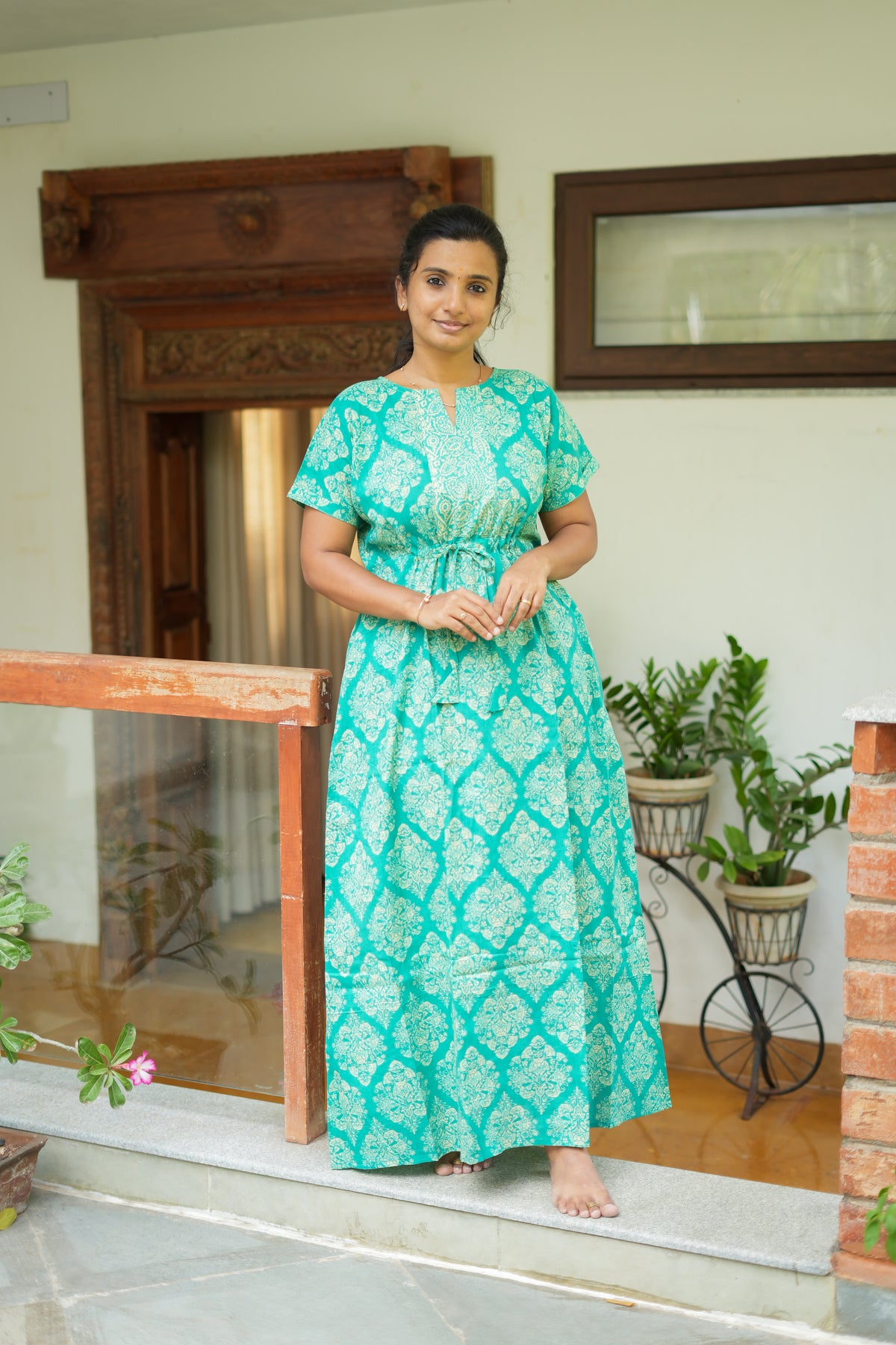 Teal green cotton maxi nighty with adjustable drawstring waist and traditional block print