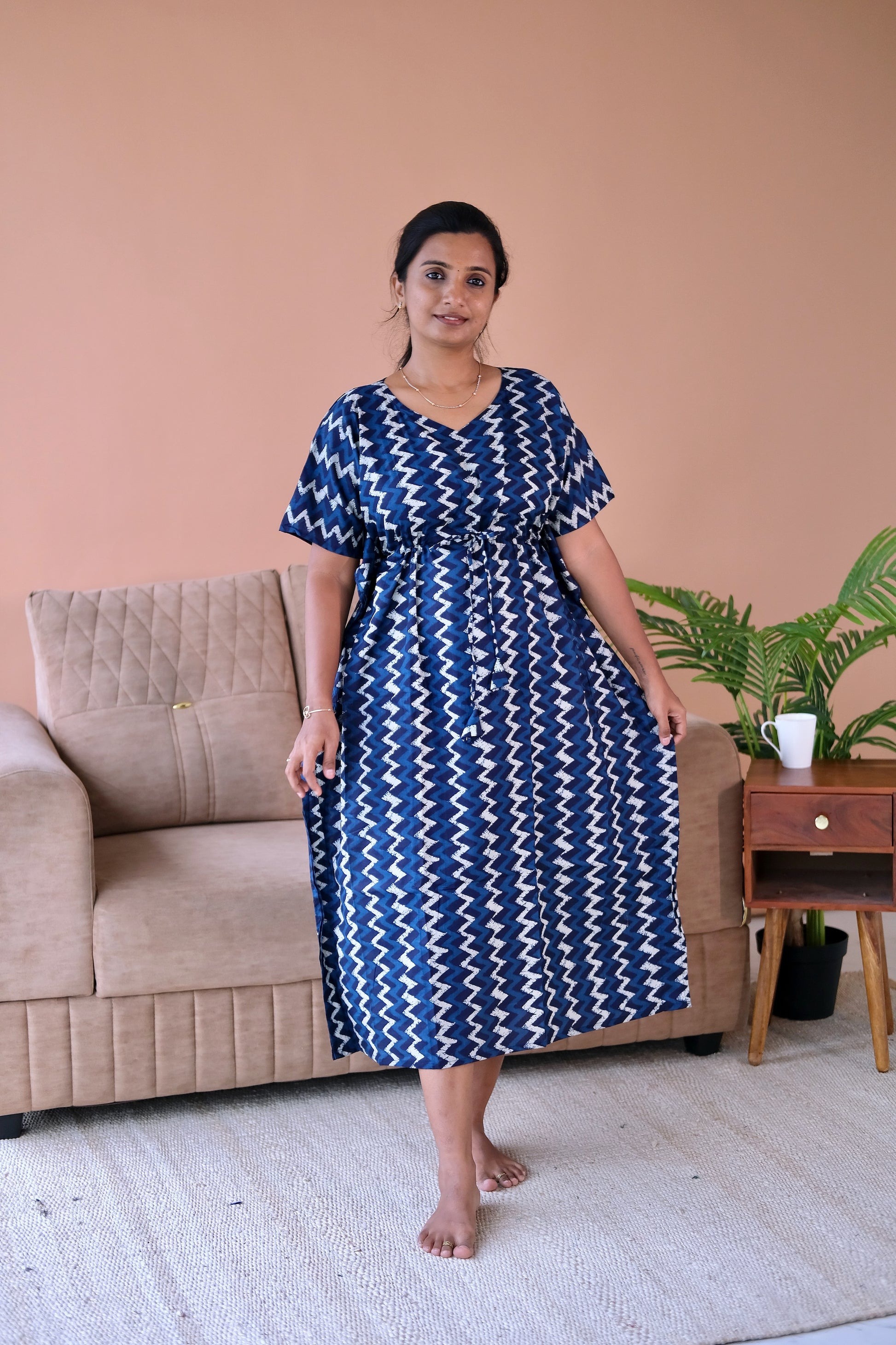 Front view of the midi-length cotton kaftan nighty in indigo blue, showcasing the relaxed fit and comfortable drape.