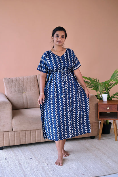 Front view of the midi-length cotton kaftan nighty in indigo blue, showcasing the relaxed fit and comfortable drape.