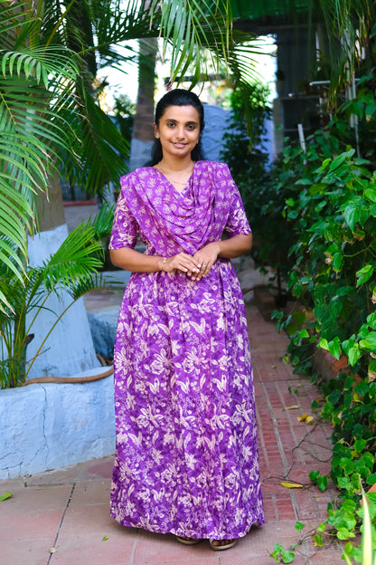 A-line purple cotton maxi nighty featuring a pleated chest overlay and short sleeves.