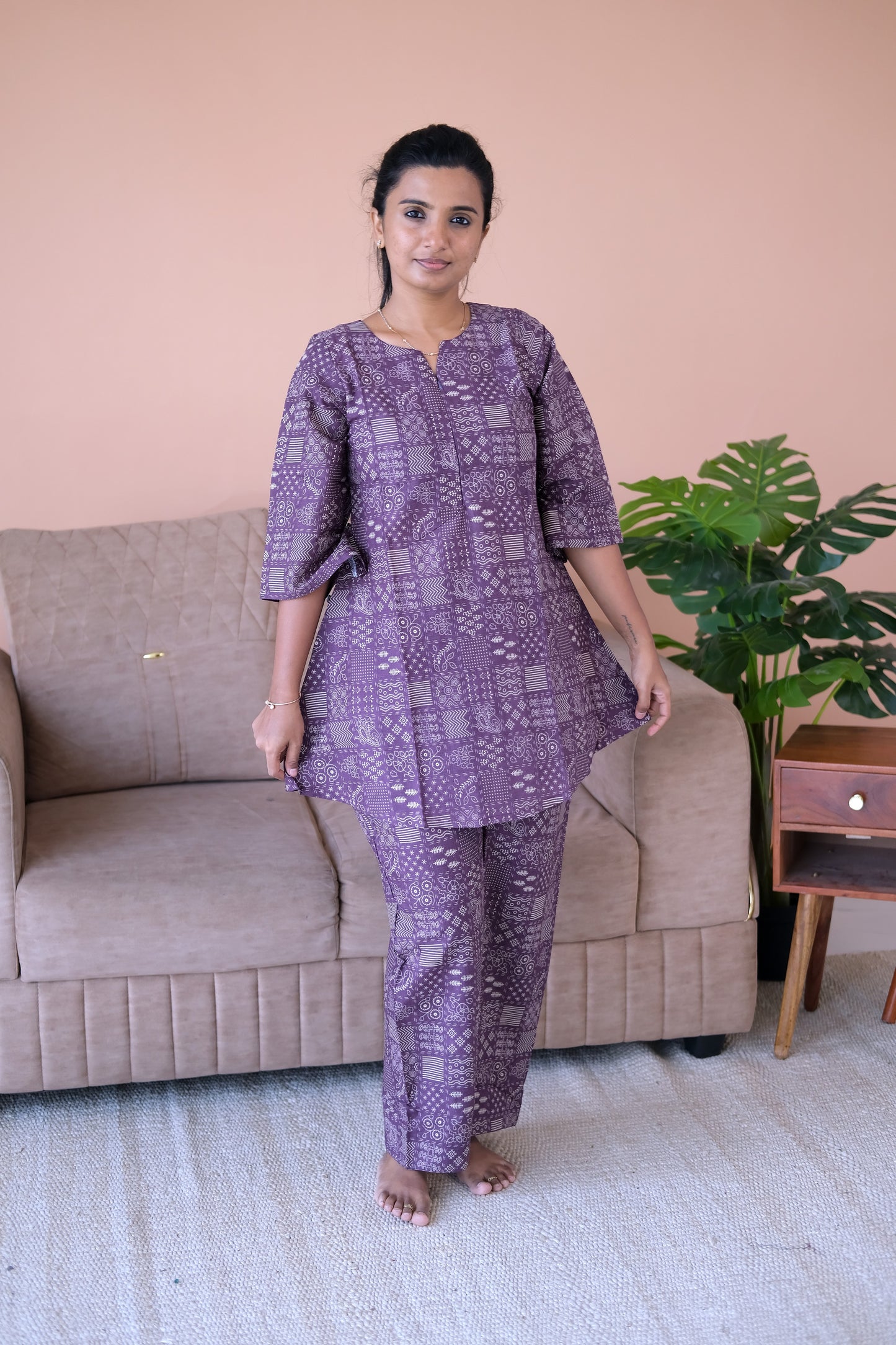 A-line flared top and straight pants of the Heera printed night suit in dusty plum cotton.