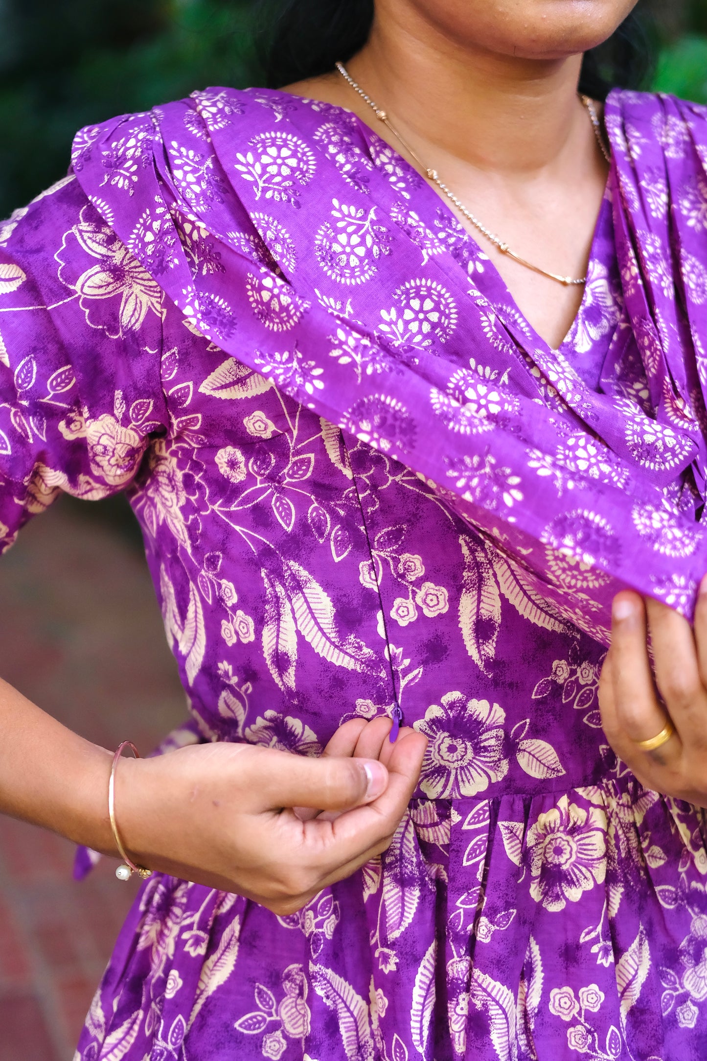 Close-up of the concealed zipper on the purple feeding friendly nighty for easy nursing access.