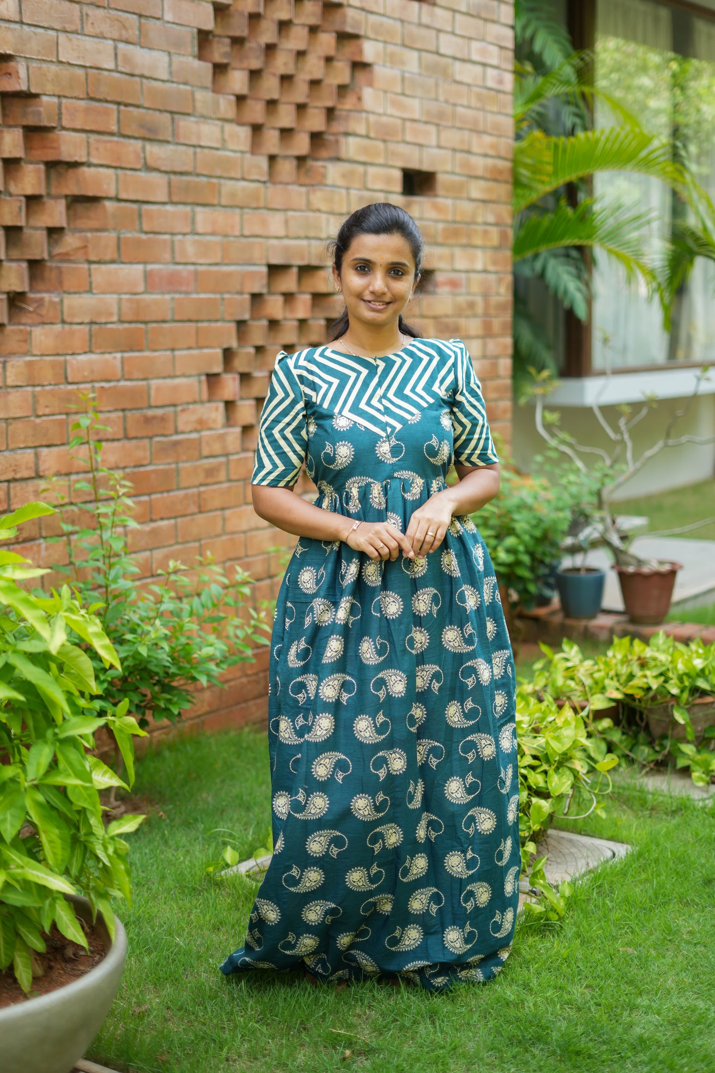 Full length view of a ladies cotton nighty in teal blue with a relaxed fit