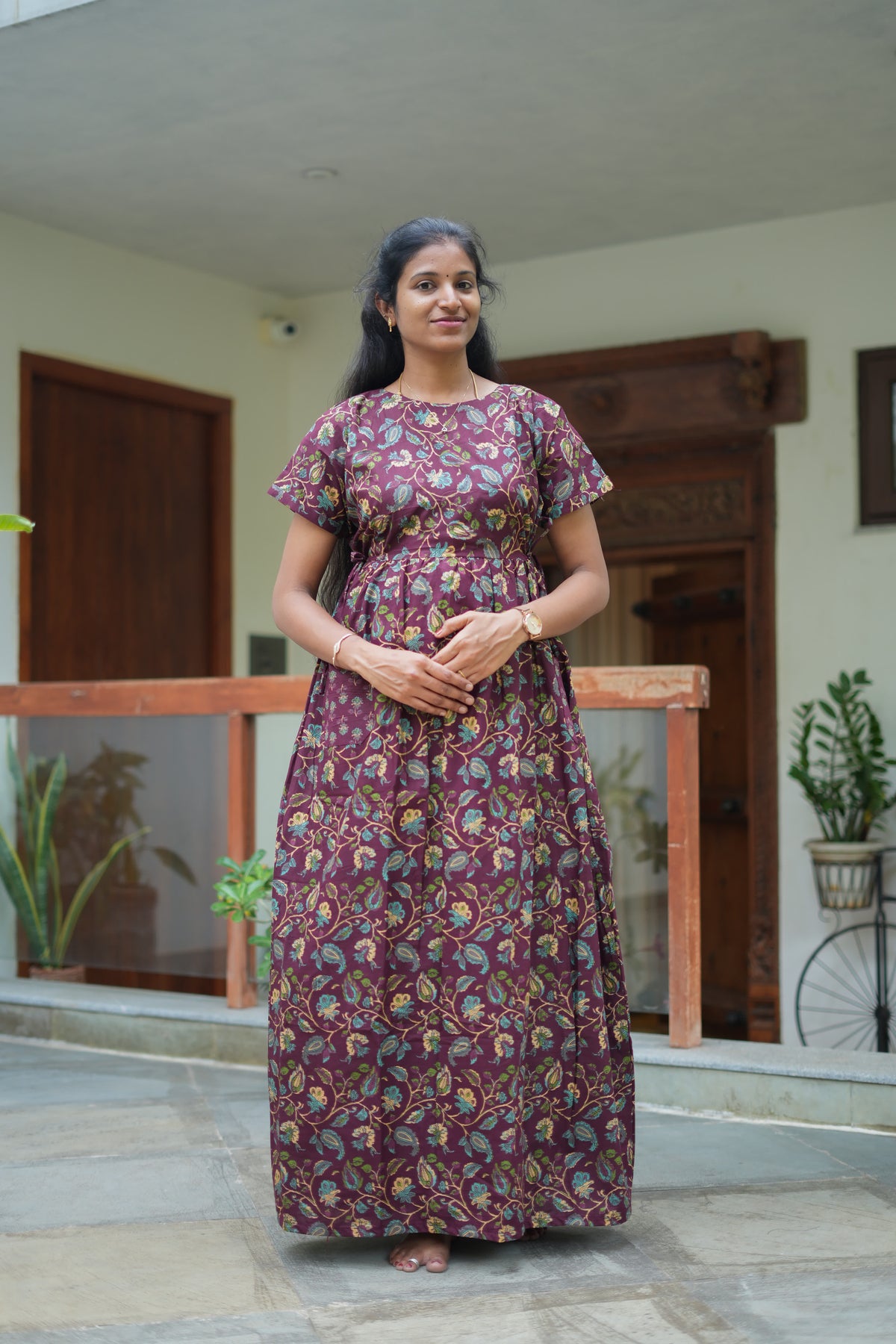 Deep maroon cotton maxi nighty with kalamkari floral print and adjustable waist tie-ups