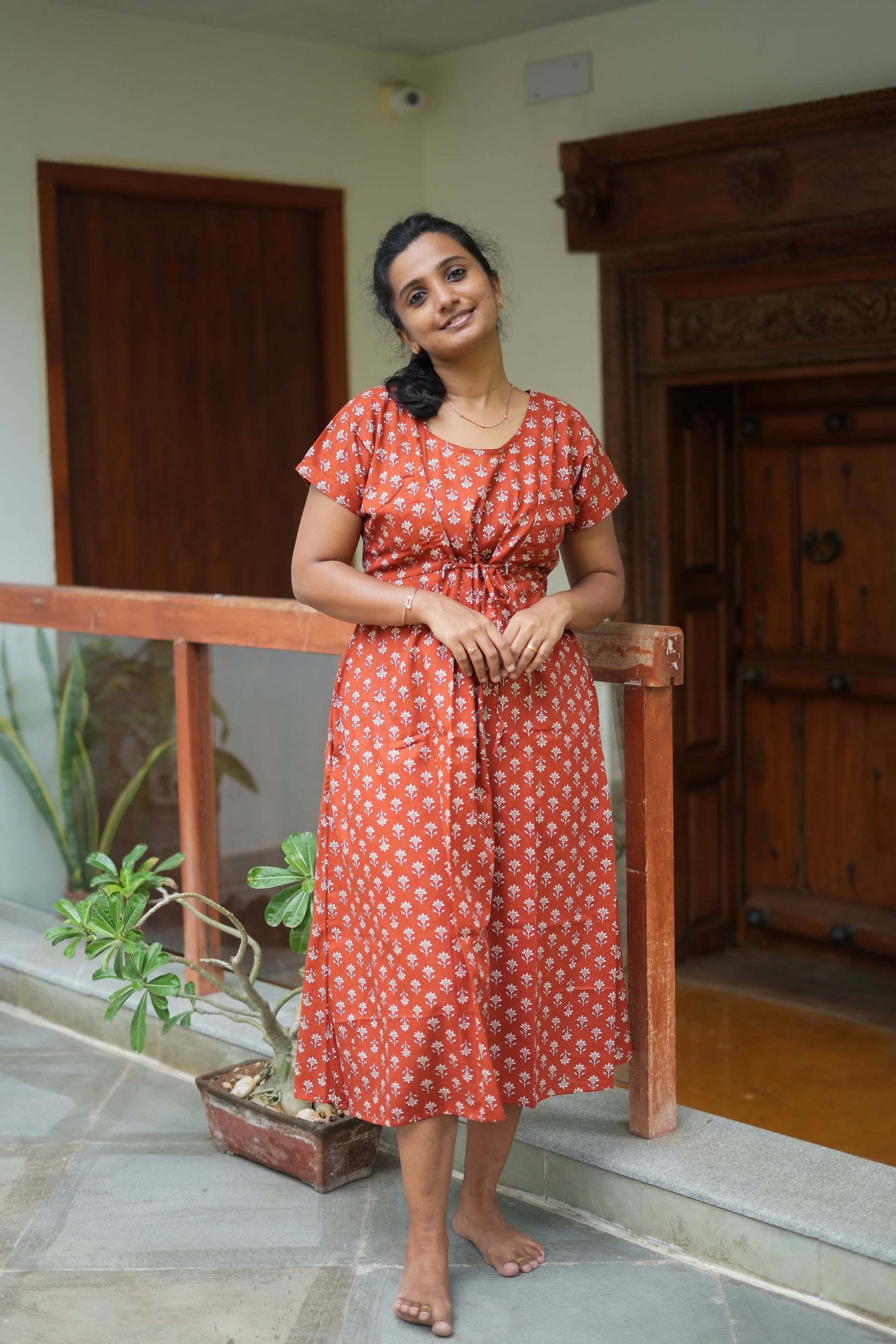 Calf-length maroon adjustable waist nighty in soft cotton fabric